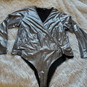 Metallic silver body suit